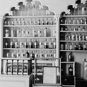 Apothecary retail shelving with glass bottles