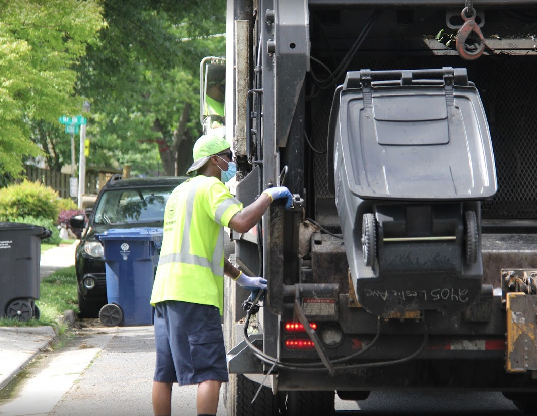 Worker collecting trash 