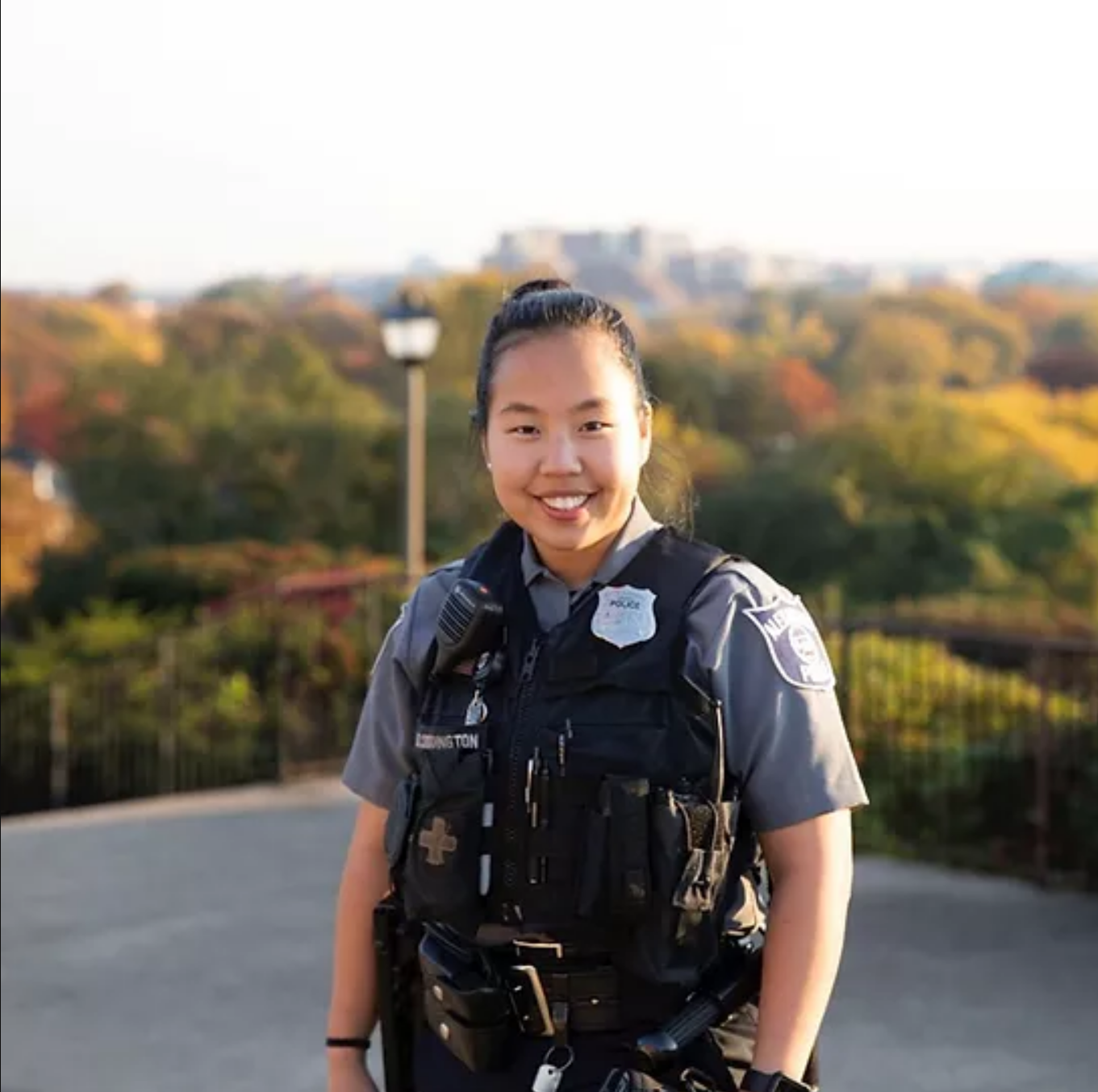 Coddington smiling and wearing an APD uniform