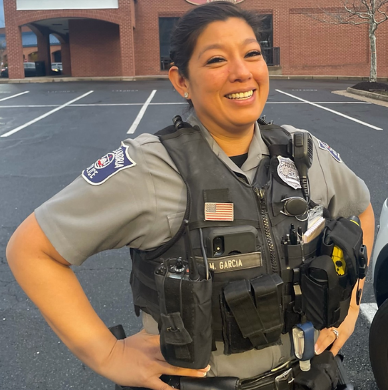 Garcia wearing a uniform and smiling 