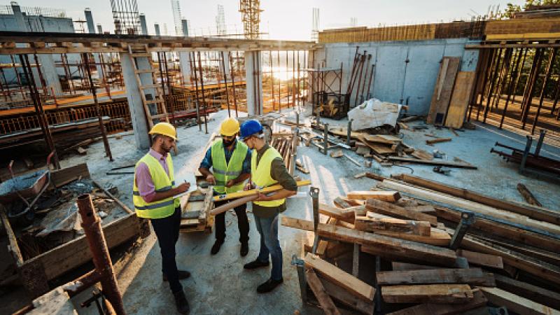 Builders reviewing plans image