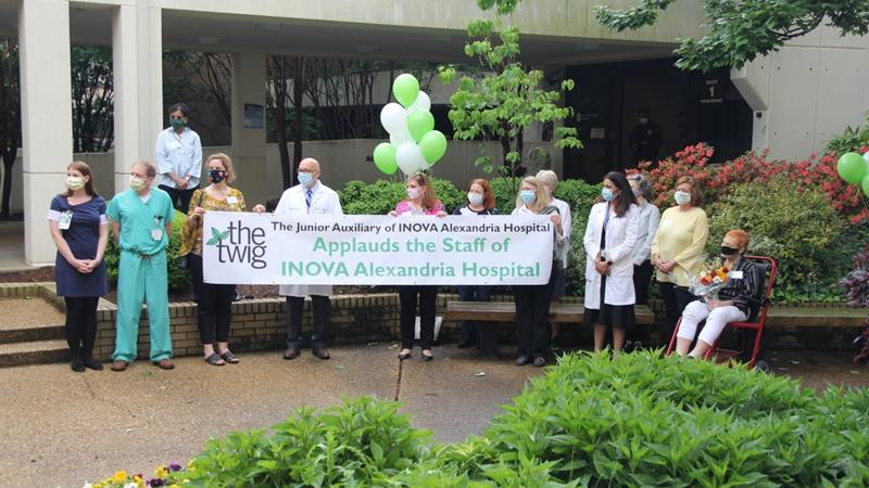 Banner, balloons, staff and TWIG members