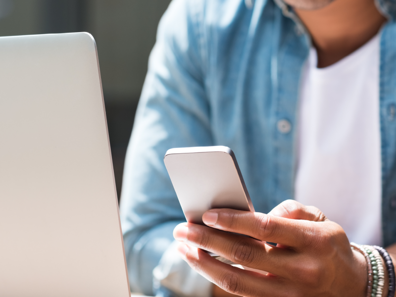 mobile phone in lady's hands web image