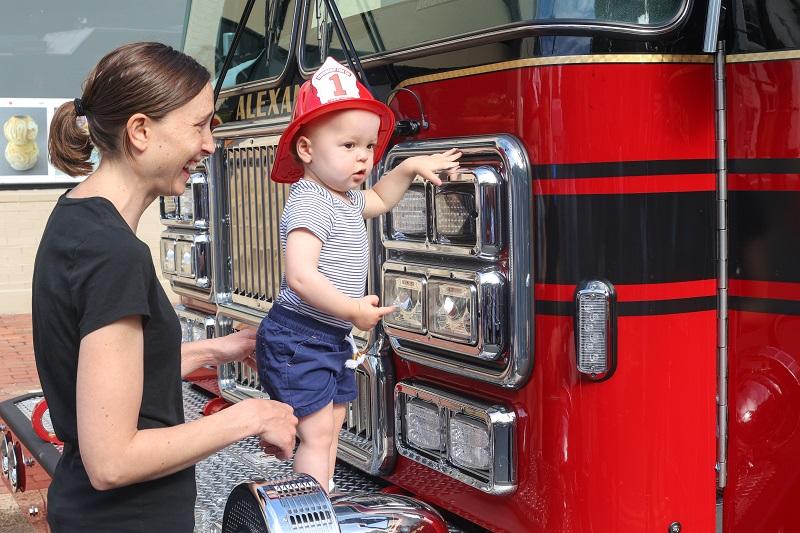 Friendship Firehouse Festival, truck with mother and child, 2022