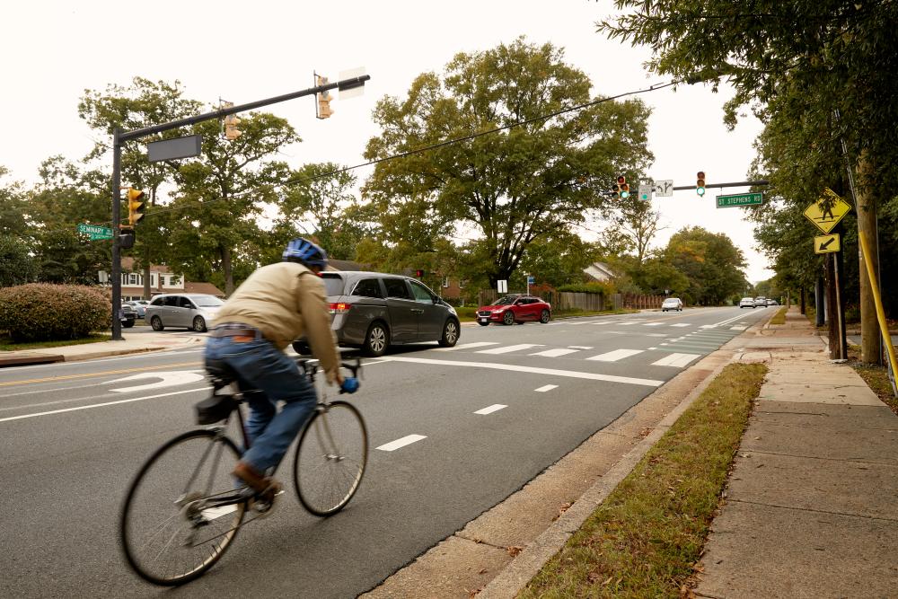 A person riding in a bike lane