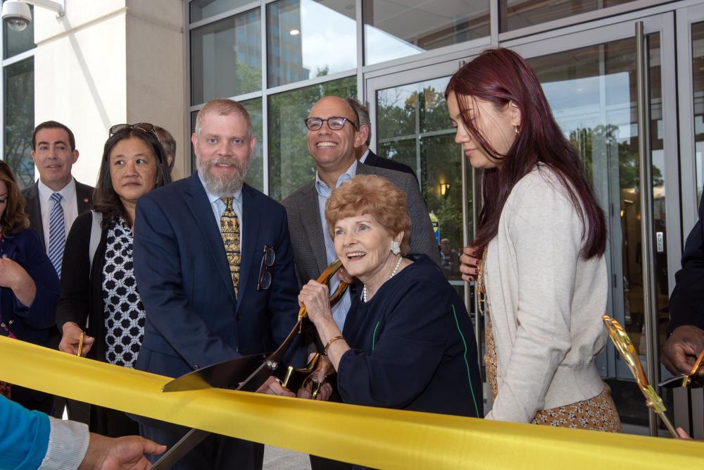 Redella S. "Del" Pepper cutting the ribbon