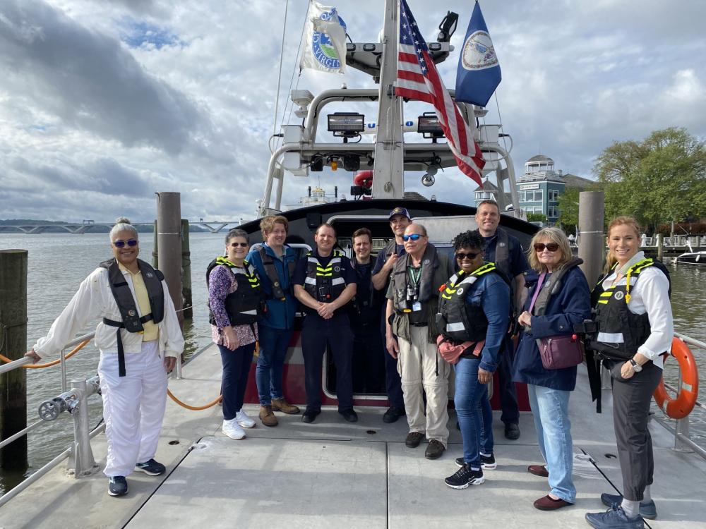 Spring 2023 Community Fire Academy participants prepare for a day on the Potomac River with Fireboat 201.