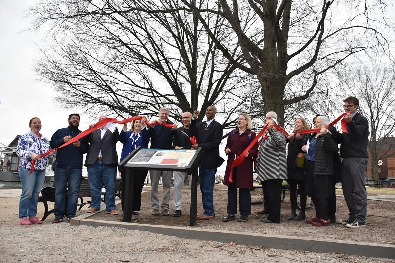 Group holding the ribbon