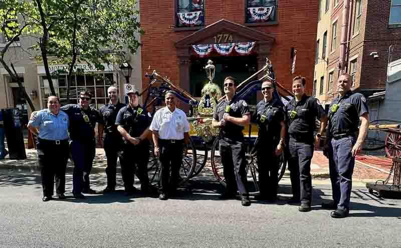 Alexandria firefighters with the suction pumper