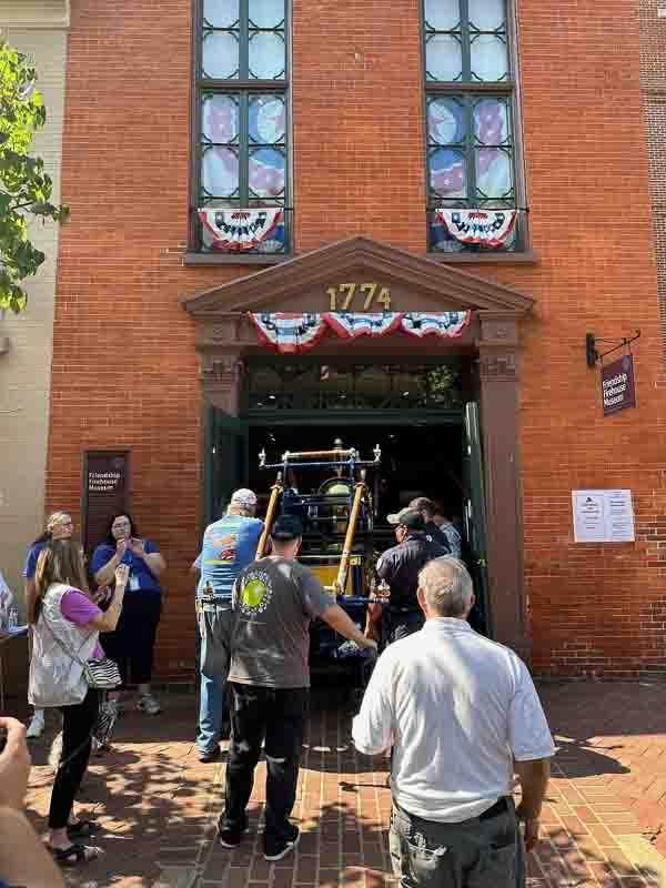 Moving the pumper into the museum, front-view