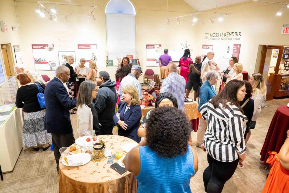 Crowd at exhibit opening