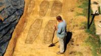 Outlines of rows of grave shafts at Contrabands and Freedmen Cemetery excavation