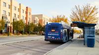 A person boarding the bus