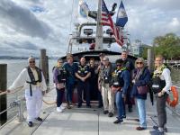 Spring 2023 Community Fire Academy participants prepare for a day on the Potomac River with Fireboat 201.