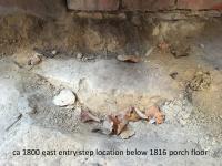 step location beneath porch floor