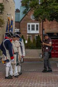 Colonial reenactors with flag