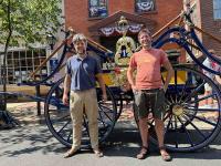 Josiah Wagener, conservator, and his brother with the Suction Engine.