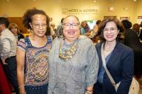 Women at exhibit opening