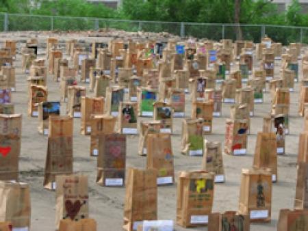 Luminary bags painted by schoolchildren, scouts, community groups and participants in decorating workshops