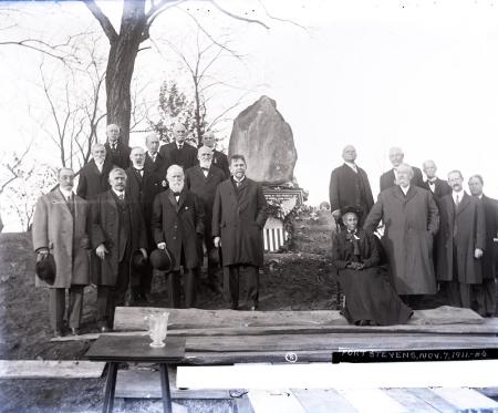 People standing in front of Lincoln Memorial Folder.