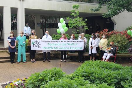 Banner, balloons, staff and TWIG members