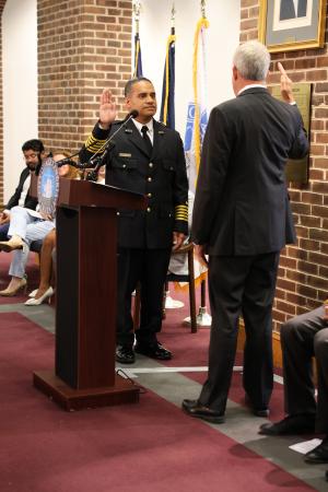 Fire Chief Felipe Hernandez Jr. being sworn as New Alexandria Fire Chief