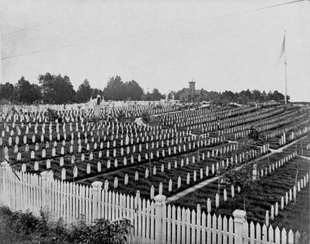 Alexandria National Cemetery with white stones and white picket fence