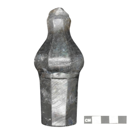 A fragment of a glass cruet