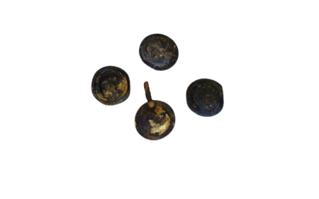 Four metal buttons that have not been conserved have a dark patina covering the otherwise shiny metal surface.