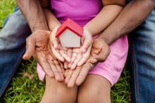 Hands Holding a Home Image